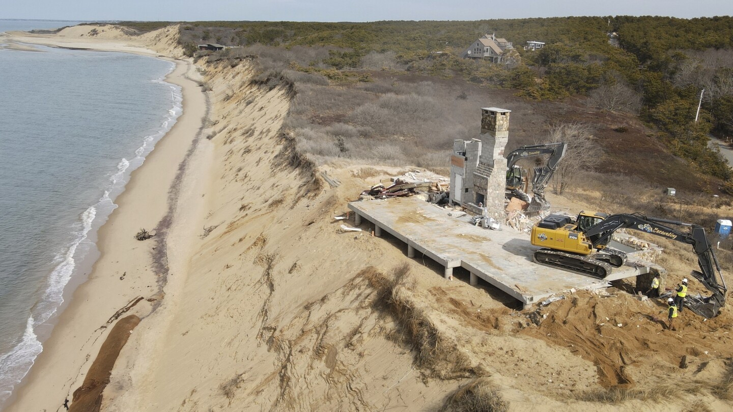 Luxury home at risk of tumbling into Cape Cod Bay over removal dispute is demolished