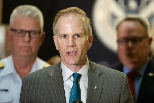 FILE - In this June 21, 2019 file photo, U.S. Attorney for the Eastern District of Pennsylvania William McSwain speaks with members of the media at a news conference at the U.S. Custom House in Philadelphia. A federal judge ruled Wednesday, Oct. 2,  that a Philadelphia nonprofit’s proposal to open the nation’s first supervised injection site does not violate federal law,the first court decision in the country to definitively weigh in on the matter. (AP Photo/Matt Rourke, File)