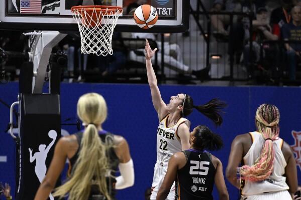 Caitlin Clark struggles early in WNBA debut before scoring 20 points in  Fever's loss to Suns | AP News