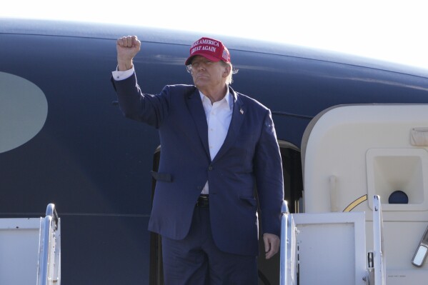 Republican presidential candidate former President Donald Trump gestures towards the crowd at a campaign rally Saturday, March 16, 2024, in Vandalia, Ohio. (AP Photo/Jeff Dean)