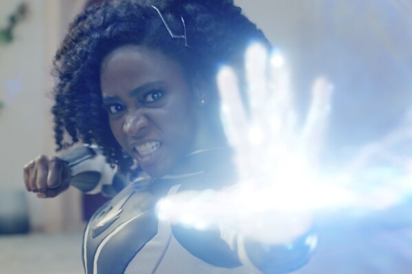 This image released by Disney shows Teyonah Parris as Captain Monica Rambeau in a scene from "The Marvels." (Laura Radford/Disney-Marvel Studios via AP)