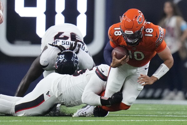 Bears need to improve offensive line to take pressure off Caleb Williams |  AP News