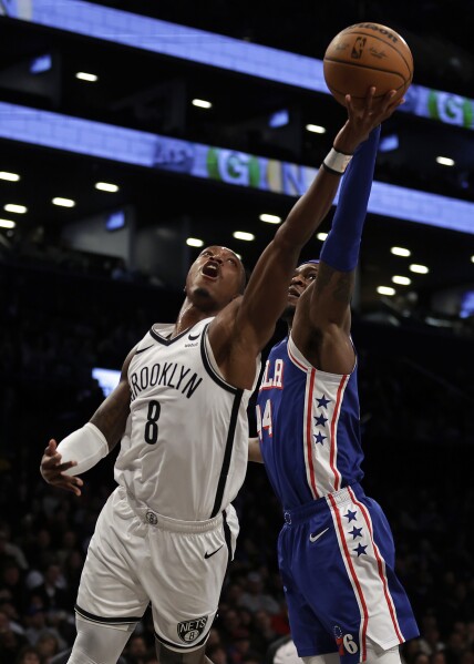 Schroder and Finney-Smith each score 20 in Nets' 112-107 win over the  short-handed 76ers