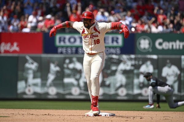 St. Louis Cardinals' Jordan Walker celebrates after hitting a two-run double in the seventh inning of a baseball game against the Arizona Diamondbacks, Saturday May 24, 2025, in St. Louis. (AP Photo/Joe Puetz)