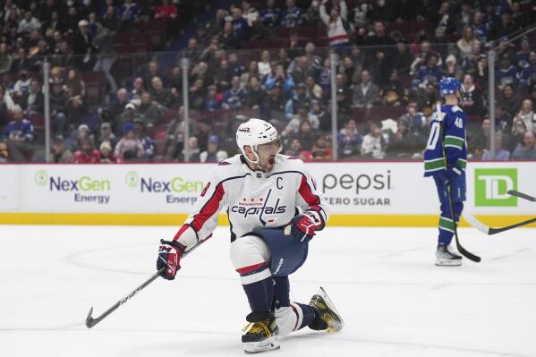 Washington Capitals' Alex Ovechkin celebrates a goal against the Vancouver Canucks during the first period of an NHL hockey game Tuesday, Nov. 29, 2022, in Vancouver, British Columbia. (Darryl Dyck/The Canadian Press via AP)