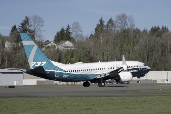 FILE - A Boeing 737 MAX 7 takes off on its first flight, Friday, March 16, 2018, in Renton, Wash. Boeing is asking federal regulators to exempt a new model of its 737 Max airliner from a safety standard designed to prevent part of the engine housing from overheating and breaking off during flight. Boeing needs the exemption to begin delivering the new, smaller Max 7 to airlines.(AP Photo/Jason Redmond, File)