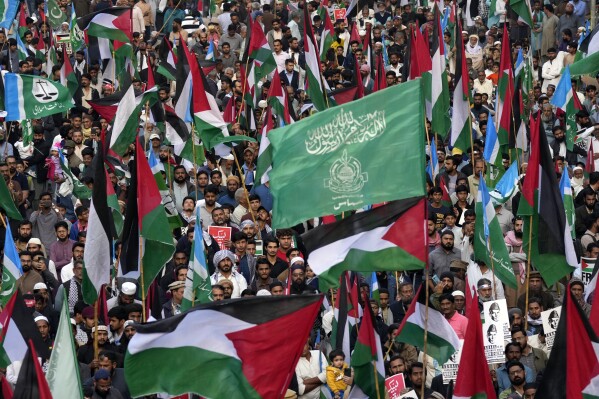 Supporters of Jamaat-e-Islami chant slogans during a protest against Israeli airstrikes and to show solidarity with Palestinian people living in Gaza, in Karachi, Pakistan, Sunday, Jan. 14, 2024. (AP Photo/Fareed Khan)