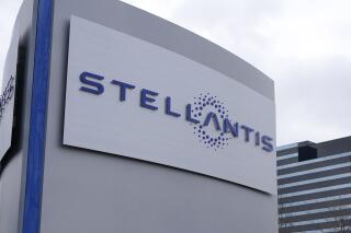 FILE - In this file photo taken on Jan. 19, 2021, the Stellantis sign is seen outside the Chrysler Technology Center, Tuesday,, in Auburn Hills, Mich. The U.S. Department of Labor said Thursday, Feb. 9, 2023 that Stellantis will create more lactation rooms at its Sterling Heights, Michigan auto plant and fix its break policy after the department found that the automaker violated the rights of nursing mothers who work there. (AP Photo/Carlos Osorio)