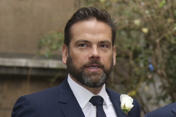 FILE - Lachlan Murdoch arrives at St Bride's Church for the celebration ceremony of the wedding of Rupert Murdoch and Jerry Hall in London, Saturday, March 5, 2016. (Photo by Joel Ryan/Invision/AP, File)