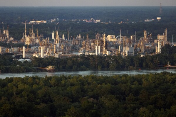 The community of Geismar is seen in the shadow of a chemical and petroleum industrial corridor, that is a known source of ethylene oxide emissions, in Ascension Parish, La., Friday, June 7, 2024. (AP Photo/Gerald Herbert, File)