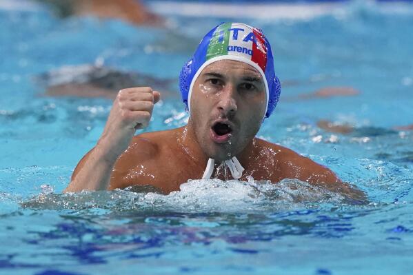 Italy's Pietro Figlioli celebrates after a score against the United States during a preliminary round men's water polo match at the 2020 Summer Olympics, Thursday, July 29, 2021, in Tokyo, Japan. (AP Photo/Mark Humphrey)
