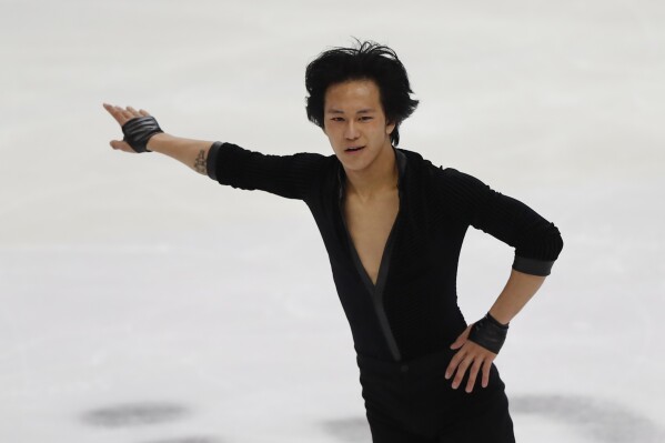 Adam Siao Him Fa of France performs in the men's short program during the ISU European Figure Skating Championships in Kaunas, Lithuania, Wednesday, Jan. 10, 2024. (AP Photo/Mindaugas Kulbis)