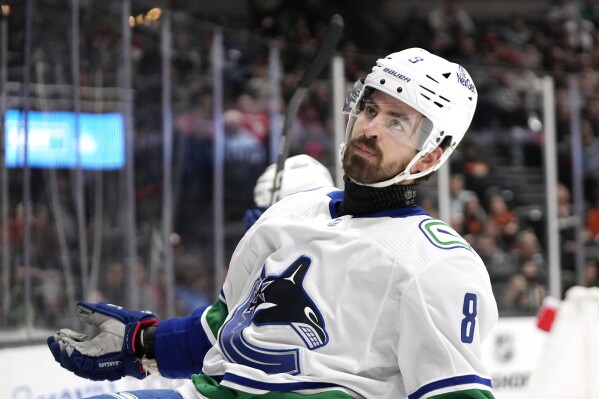 Vancouver Canucks right wing Conor Garland celebrates his goal during the second period of an NHL hockey game against the Anaheim Ducks Sunday, March 3, 2024, in Anaheim, Calif. (AP Photo/Mark J. Terrill)