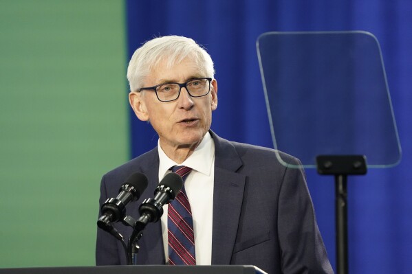 FILE - Wisconsin Gov. Tony Evers speaks at the Madison Area Technical College Truax campus on Monday, April 8, 2024, in Madison, Wis. Evers appointed a bankruptcy attorney Friday, May 31, 2024, to replace a conservative-leaning Universities of Wisconsin regent who is refusing to step down. (AP Photo/Kayla Wolf, File)