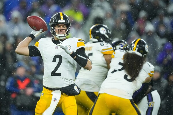 Pittsburgh Steelers quarterback Mason Rudolph throws a pass against the Baltimore Ravens during the first half of an NFL football game, Saturday, Jan. 6, 2024 in Baltimore. (AP Photo/Matt Rourke)