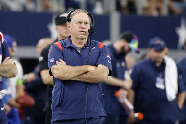New England Patriots head coach Bill Belichick watches play against the Dallas Cowboys in the second half of an NFL football game in Arlington, Texas, Sunday, Oct. 1, 2023. (AP Photo/Michael Ainsworth)
