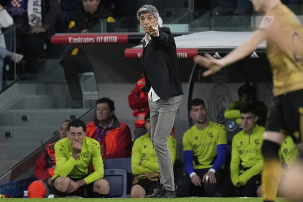 Real Sociedad's head coach Imanol Alguacil gives instructions during the Spanish Copa del Rey semifinal second leg soccer match between Real Madrid and and Real Sociedad in Madrid, Spain Tuesday, April 1, 2025. (AP Photo/Bernat Armangue)