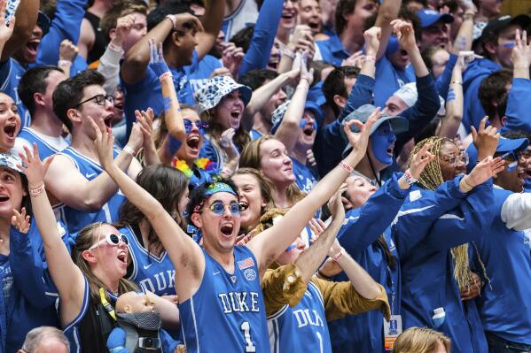 FILE - Duke student fans react during an NCAA college basketball game against Miami on Saturday, Jan. 21, 2023, in Durham, N.C. Duke’s famously rowdy students spent weeks camping out and getting ready for Saturday’s annual rivalry game with North Carolina. And everyone from successor Jon Scheyer to the “Cameron Crazies" remain determined to preserve the fearsome homecourt advantage that is part of former coach Mike Krzyzewski’s unparalleled legacy. (AP Photo/Jacob Kupferman, File)