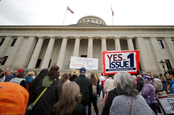 FILE - Supporters of Issue 1 attend a rally for the Right to Reproductive Freedom amendment held by Ohioans United for Reproductive Rights at the Ohio State House in Columbus, Ohio, Oct. 8, 2023. (AP Photo/Joe Maiorana, File)