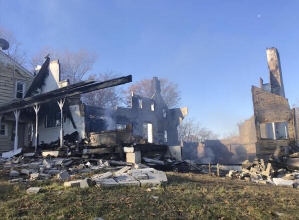 This photo provided by the Montgomery County Fire Rescue Service shows the remains of a home that was heavily damaged by fire after the homeowner attempted to use smoke to purge snakes from the house, in Poolesville, Md., a town about 25 miles (about 40 kilometers) outside of Washington. (Montgomery County Fire Rescue Service via AP)