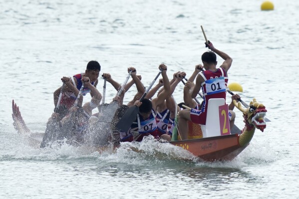North Korea's dragon boat team takes part in the Men's Dragon Boat 200m Semi-final during the 19th Asian Games at the Wenzhou Dragon Boat Center in Wenzhou, China, Wednesday, Oct. 4, 2023. (AP Photo/Eugene Hoshiko)