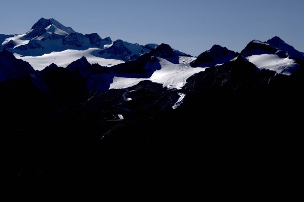 The Tiefenbachferner Glacier, part of glacier ski resort Soelden, with Wildspitze mountain is visible near Innsbruck, Austria, Monday, Sept. 25, 2023. (AP Photo/Matthias Schrader)