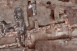 
              This undated photo provided by the Greek Ministry of Culture on Tuesday, Nov. 13, 2018, shows remains of walls and floors, probably from houses, from the lost ancient city of Tenea. The ministry said Tuesday archaeologists have located the first tangible remains of the city that, according to tradition, was first settled by Trojan war captives after the Greek sack of Troy. (Greek Culture Ministry via AP)
            