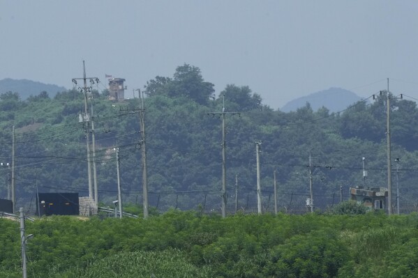 A North Korean military guard post, top left, and South Korea post, bottom right, are seen in Paju near the border with North Korea, South Korea, Wednesday, July 19, 2023. North Korea was silent about the highly unusual entry of an American soldier across the Koreas' heavily fortified border although it test-fired short-range missiles Wednesday in its latest weapons display. (AP Photo/Ahn Young-joon)