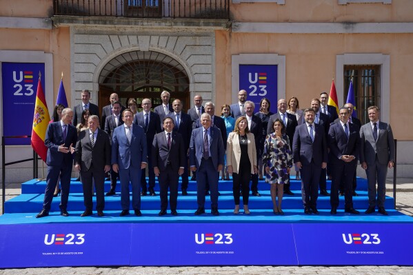 European Union foreign policy chief Josep Borrell, centre, poses with the 27 EU foreign ministers during an EU foreign ministers meeting in Toledo, central Spain, Thursday, Aug. 31, 2023. EU foreign ministers are gathering for a one-day informal meeting in Toledo. (AP Photo/Andrea Comas)