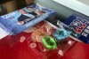 This image taken from video shows liquid laundry detergent balls inside a package given by Nationalist Party (KMT) as a gift for supporter in Chunghwa, Central Taiwan, Saturday Jan. 6, 2024. At least three people have been hospitalized after mistakenly eating colorful pods of liquid laundry detergent that were distributed as a campaign freebie in Taiwan’s presidential race. (TVBS via AP)