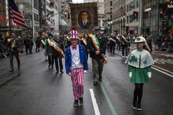 FILE - Participants march up Fifth Avenue during the St. Patrick's Day Parade, Thursday, March 17, 2022, in New York. (AP Photo/Eduardo Munoz Alvarez, File)