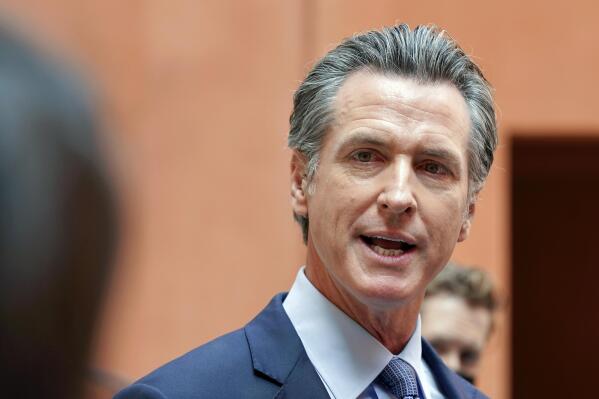 FILE - In this Sept. 10, 2021, file photo California Gov. Gavin Newsom responds to a question while meeting with reporters after casting his recall ballot at a voting center in Sacramento, Calif. The last day to vote in the recall election is Tuesday Sept. 14. A majority of voters must mark "no" on the recall to keep Newsom in office. (AP Photo/Rich Pedroncelli, File)