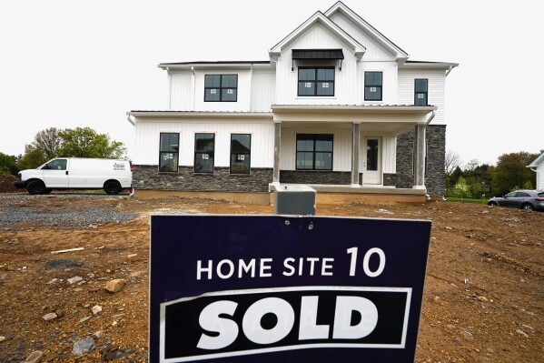 FILE - A home under construction marked as "SOLD" at a development in Eagleville, Pa., is shown on Friday, April 28, 2023. The United States is slogging through a housing affordability crisis that was decades in the making. The shortage pours cold water on President Joe Biden's assurances that the U.S. economy is strong and underscores the degree to which Republican presidential candidate, former President Donald Trump, has largely overlooked the issue. (AP Photo/Matt Rourke, File)