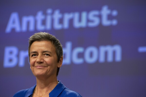 FILE - European Commissioner for Competition Margrethe Vestager speaks during a media conference regarding an anti-trust decision on Broadcom at EU headquarters in Brussels, Wednesday, Oct. 16, 2019. Margrethe Vestager, the European Union’s Commission’s powerful antitrust chief who took unpaid leave to seek the top job at European Investment Bank, is returning to the EU’s executive arm for the next few months, Denmark's government said Friday, Dec. 8, 2023. (APPhoto/Virginia Mayo, File)