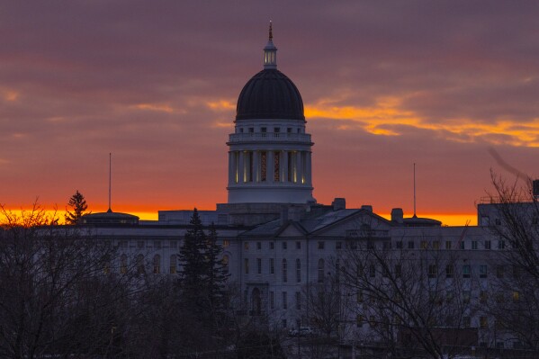 FILE - The Maine State House is seen at dawn, Jan. 3, 2024, in Augusta, Maine. A series of gun safety bills introduced after the deadliest shooting in Maine history appears to be headed toward final passage as the state Legislature races to wrap up its session the week of April 15, 2024. (AP Photo/Robert F. Bukaty, File)