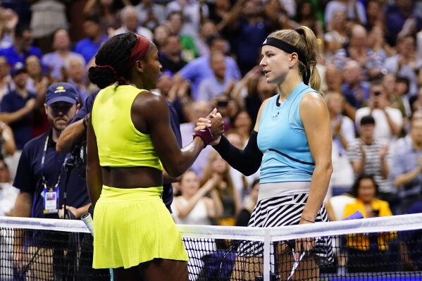 FILE - Coco Gauff, left, of the United States, shakes hands with Karolina Muchova, of the Czech Republic, after winning their match during the women's singles semifinals of the U.S. Open tennis championships, Thursday, Sept. 7, 2023, in New York. Muchova was sidelined for 10 months because of surgery on her right wrist and is making her Grand Slam return at Wimbledon.. (AP Photo/Frank Franklin II, File)