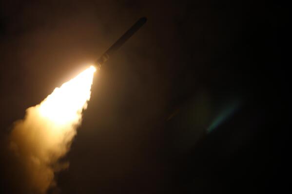FILE - In this image provided by the U.S. Navy, the guided-missile destroyer USS Laboon (DDG 58) fires a Tomahawk land attack missile on April 14, 2018, as part of the military response to Syria's use of chemical weapons on April 7. Australia said it's planning to buy up to 220 Tomahawk cruise missiles from the United States after the U.S. State Dept. approved the sale Friday, March 17, 2023. (Kallysta Castillo/U.S. Navy via AP, File)