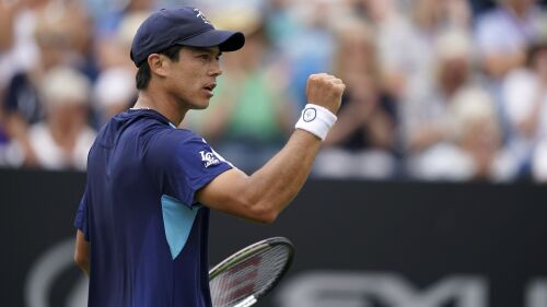 Unites States' Mackenzie McDonald reacts during his match against Unites States' Taylor Fritz in the men's singles round of 16 match on day five of the Rothesay International Eastbourne at Devonshire Park, Eastbourne, Britain, Wednesday June 28, 2023. (John Walton/PA via AP)