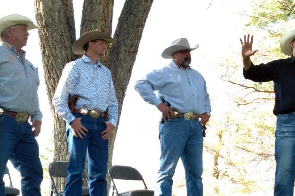 From left to right are Lander County Sheriff Ron Unger, Eureka County Sheriff Jesse Watts, Elko County Sheriff Aitor Narvaiza and Constitutional Sheriffs and Peace Officers Association Richard Mack in the Elko City Park in Elko, Nev,. on Sunday, June 20, 2020. Rural Nevada residents are celebrating moves by two county commissions to join a "constitutional sheriffs" group that argues local law enforcement has final say over how to interpret laws. (Jeff Mullins/The Daily Free Press via AP)