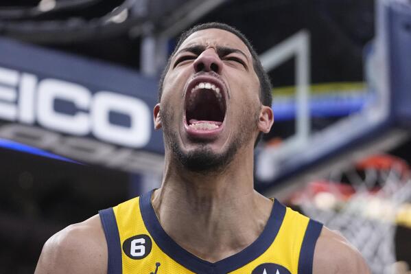 Indiana Pacers' Tyrese Haliburton reacts after a dunk during the second half of an NBA basketball game against the Sacramento Kings, Friday, Feb. 3, 2023, in Indianapolis. (AP Photo/Darron Cummings)