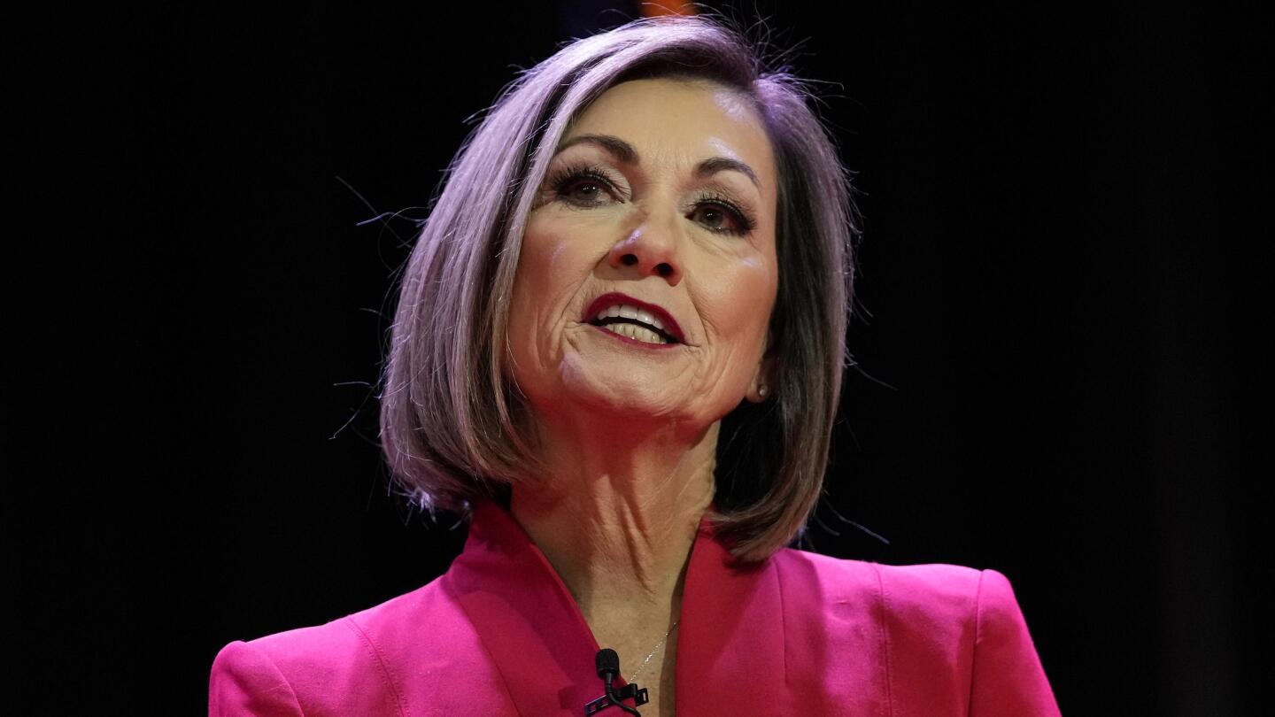 Iowa governor signs gender-affirming care ban, bathroom law