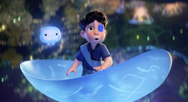 This image released by Disney/Pixar shows Elio, voiced by Yonas Kibreab, center, and OOOOO, voiced by Shirley Henderson, in a scene from "Elio." (Disney/Pixar via AP)
