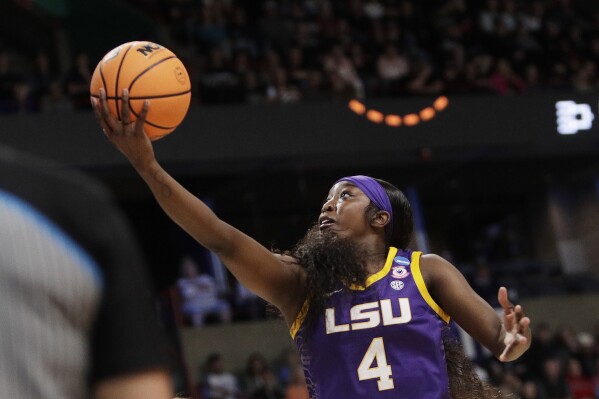 LSU guard Flau'Jae Johnson shoots during the first half against UCLA in the Elite Eight of the NCAA college basketball tournament, Sunday, March 30, 2025, in Spokane, Wash. (AP Photo/Young Kwak)
