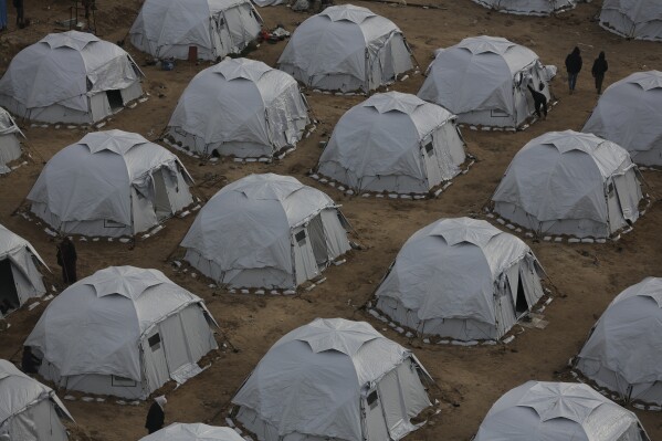 A tent camp for the Palestinians is installed in the middle of the buildings destroyed in the west of the Al-Shati camp, west of Gaza City, Monday March 3, 2025. (AP photo / Jehad Alshrafi)