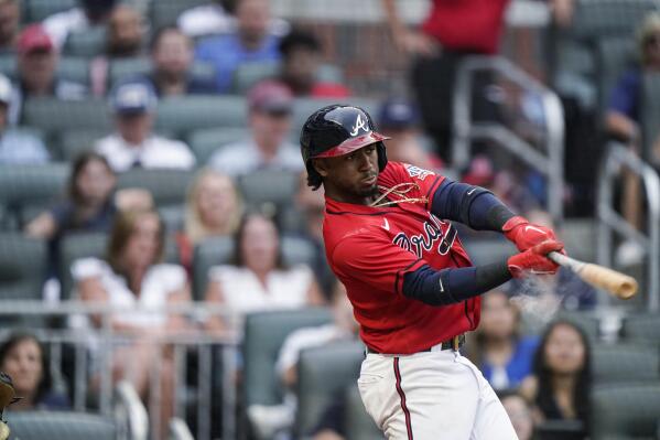 Taylor clears bases in 8-run fifth, Dodgers beat Braves 9-5