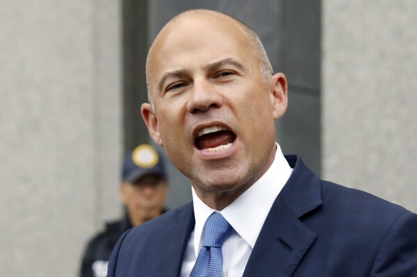 FILE - Michael Avenatti makes a statement to the press as he leaves federal court in New York, on July 23, 2019. The Supreme Court has left in place lawyer Michael Avenatti’s conviction for plotting to extort up to $25 million from Nike. The justices did not comment Tuesday in rejecting an appeal from the California-based lawyer, who represented porn actor Stormy Daniels in litigation against ex-President Donald Trump. (AP Photo/Richard Drew, File)
