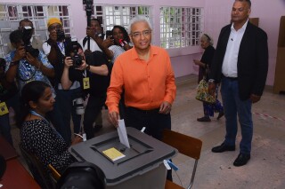 Prime Minister Pravind Jagnauth casts his vote in Mauritian elections in Port Louis, Sunday Nov. 10, 2024. (La Sentinelle via AP)