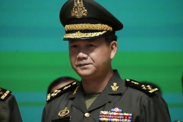 Cambodian army chief Hun Manet, a son of Cambodian Prime Minister Hun Sen, attends a ceremony of the Royal Cambodian Armed Forces at the Defense Ministry in Phnom Penh, Cambodia, Thursday, April 20, 2023. Hun Manet, who is widely expected to replace his father, Hun Sen, as the country’s prime minister later this year, was promoted on Thursday to his country’s highest military rank. (AP Photo/Heng Sinith)
