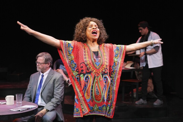 This image shows Burnadair Lipscomb-Hunt during a performance of "American Rot," playing through March 31 at the Ellen Stewart Theatre in New York. (Steven Pisano/Sam Rudy Public Relations via AP)