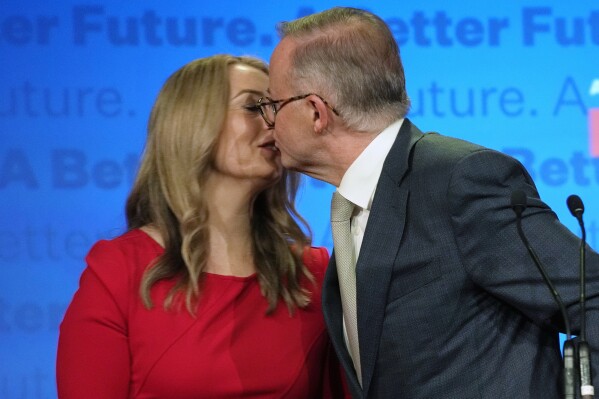 FILE - Anthony Albanese, right, kisses his partner partner Jodie Haydon while thanking supporters at a Labor Party event in Sydney, Australia, May 22, 2022, following a national election. Albanese has become the first Australian prime minister to get engaged while in office, revealing Thursday, Feb. 15, 2024, that his partner Haydon accepted his marriage proposal on Valentine's Day. (AP Photo/Rick Rycroft, File)